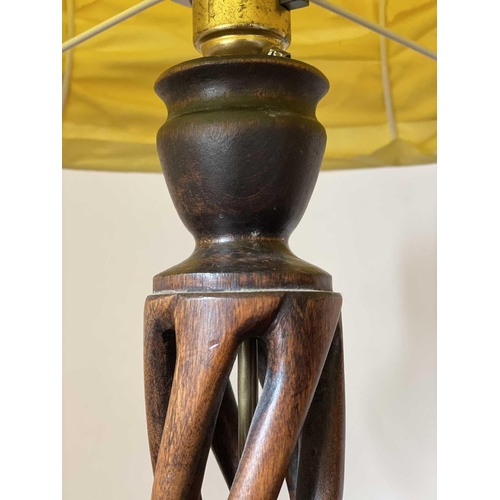 348 - A 1930's oak table lamp, with open spiral work stem, total height 75cm.