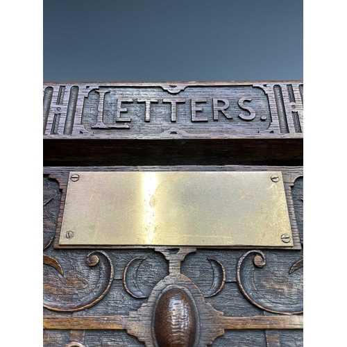 349 - A Victorian oak country house postbox, with carved decoration, inscribed Letters, with glazed front ... 