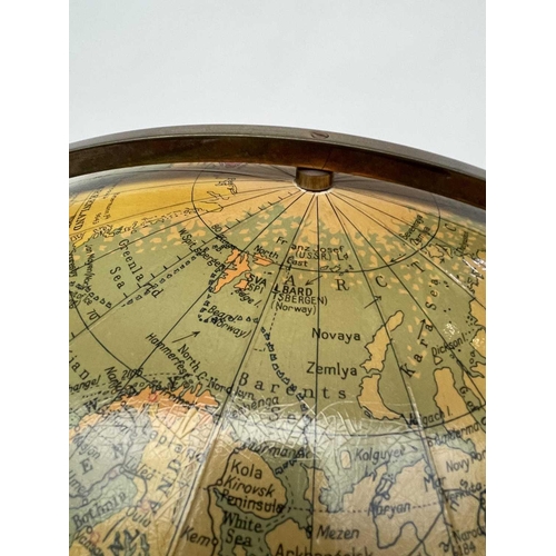 350 - A 50cm diameter Philips' terrestrial globe, circa 1965, on a Regency style mahogany stand. Overall h... 