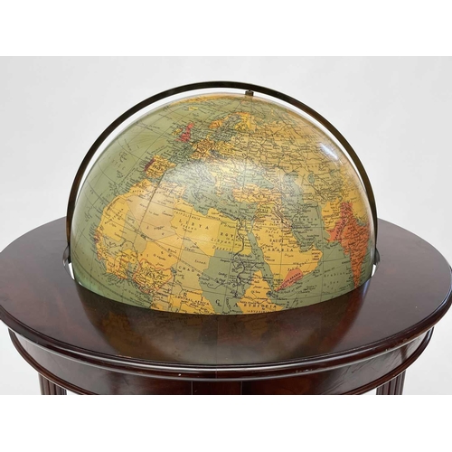 350 - A 50cm diameter Philips' terrestrial globe, circa 1965, on a Regency style mahogany stand. Overall h... 