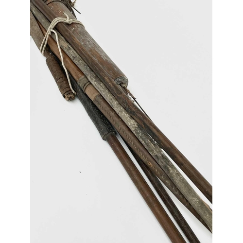 352 - Quiver of arrows, spears (possibly native), etc