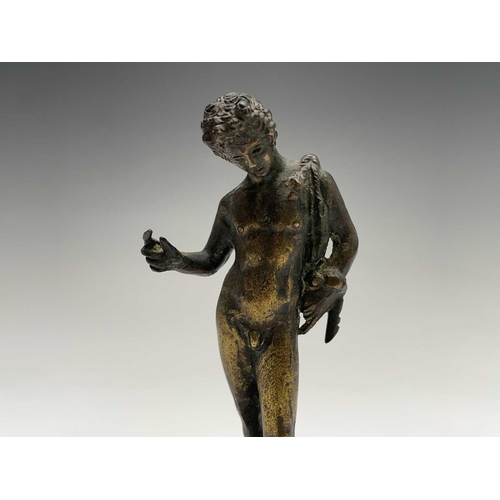 353 - An 18th/19th century gilt bronze figure of Jason, on carved stone base. Height 16cm.