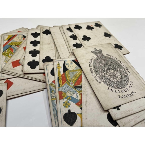 357 - A set of De La Rue & Co playing cards, with black and gilt backs, 9.4X6.4cm. Provenance: Michael Tre... 