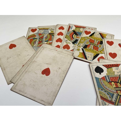 357 - A set of De La Rue & Co playing cards, with black and gilt backs, 9.4X6.4cm. Provenance: Michael Tre... 