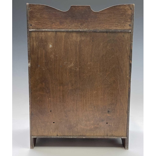 362 - An Edwardian oak two door smoker's cabinet with fitted interior, with key. Height 46.5cm, width 32.5... 