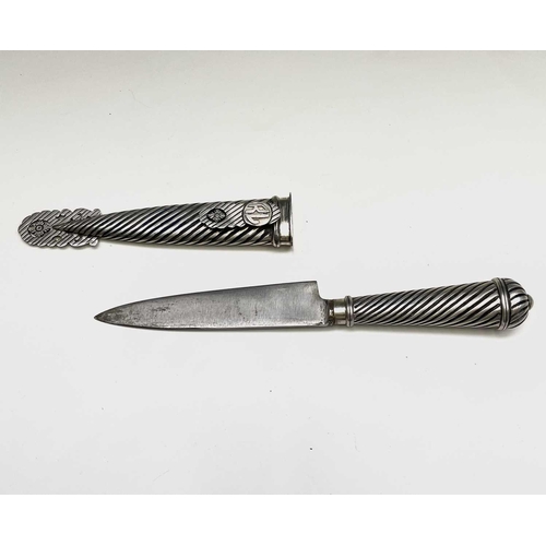 37 - An Argentinian gaucho knife, mid 20th century, with spiral white metal grip and similarly decorated ... 