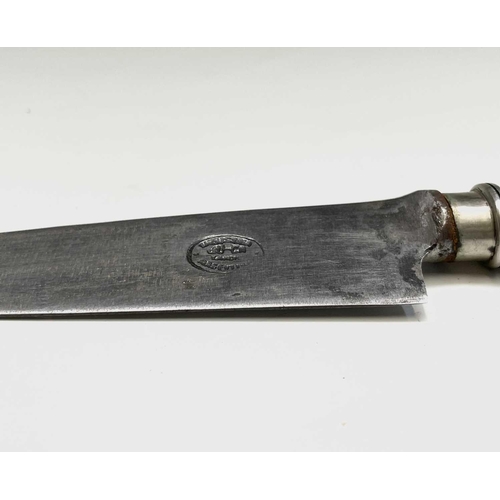 37 - An Argentinian gaucho knife, mid 20th century, with spiral white metal grip and similarly decorated ... 