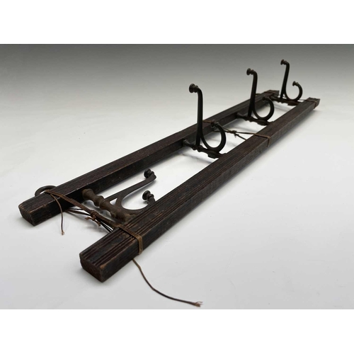 383 - An Edwardian reeded oak coat rack, fitted with four folding steel hooks, width 55cm, together with a... 