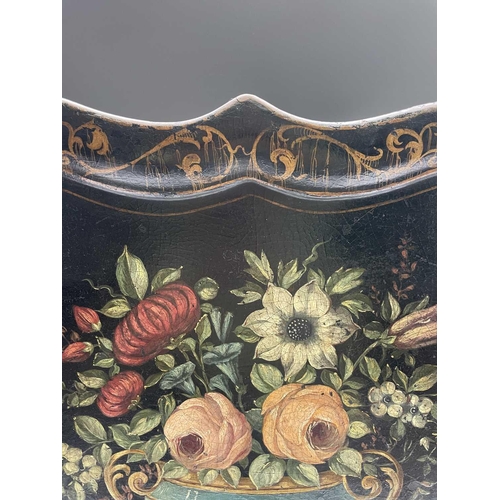 384 - A 19th century papier-mache tray, painted with a flower filled urn, 60X77cm.