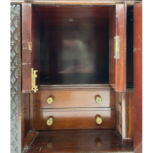 385 - An Edwardian mahogany humidor fitted with a bevelled edge glazed door, with fitted interior and a fu... 