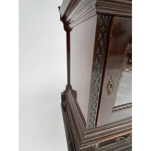 385 - An Edwardian mahogany humidor fitted with a bevelled edge glazed door, with fitted interior and a fu... 