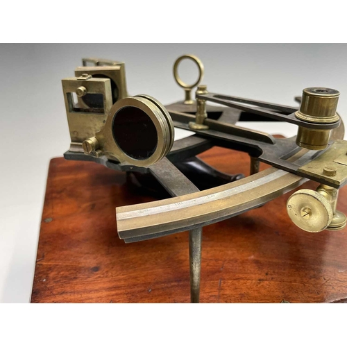 399 - A brass and lacquered sextant, by Robert Young & Son, Glasgow, in mahogany case, width 27.5cm.