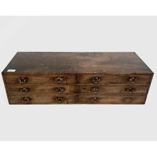 401 - A Victorian oak bank of six drawers. Height 21cm, width 78cm, depth 28.5cm.