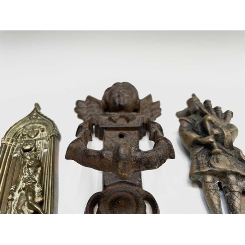 404 - Six novelty door knockers comprising cherub, (bag)piper, owl, cat, pixie, and Durham 'Sanctuary' doo... 