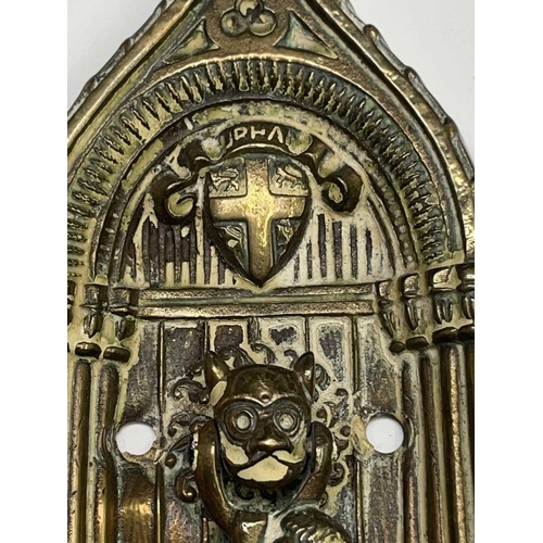 404 - Six novelty door knockers comprising cherub, (bag)piper, owl, cat, pixie, and Durham 'Sanctuary' doo... 