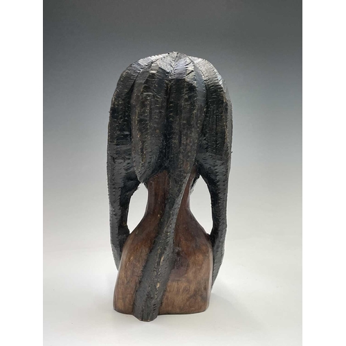 406 - An Indian carved coconut, on elephant stand, height 18cm, together with a carved ethnic figure etc (... 