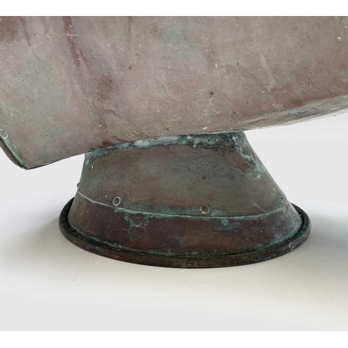 409 - A Victorian heavy copper coal helmet, with swing handle and circular foot, width 48cm.