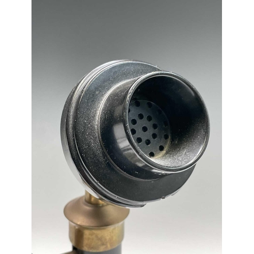 41 - A brass, painted metal and bakelite candlestick telephone, stamped PX150, height 33cm.