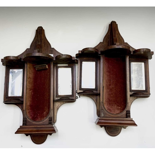 410 - A pair of Victorian rosewood and boxwood strung wall niche, each with an arched velvet lined centre ... 