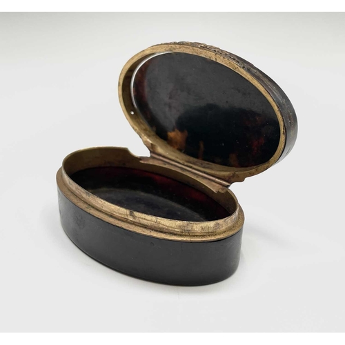 412 - A 19th century tortoiseshell and pique snuff box, with oval enamel inset portrait medallion, width 7... 