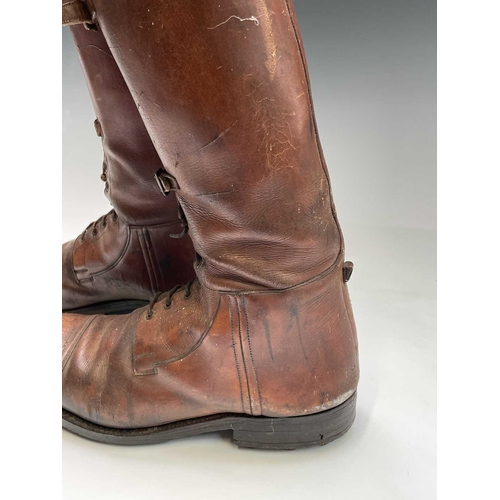 414 - A pair of russet brown gentleman's hobnail boots, possibly military, height 45cm.