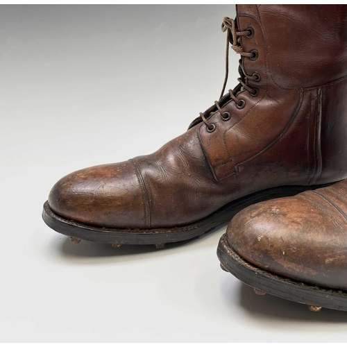 414 - A pair of russet brown gentleman's hobnail boots, possibly military, height 45cm.