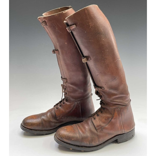 414 - A pair of russet brown gentleman's hobnail boots, possibly military, height 45cm.