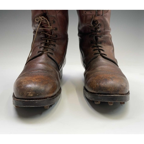 414 - A pair of russet brown gentleman's hobnail boots, possibly military, height 45cm.