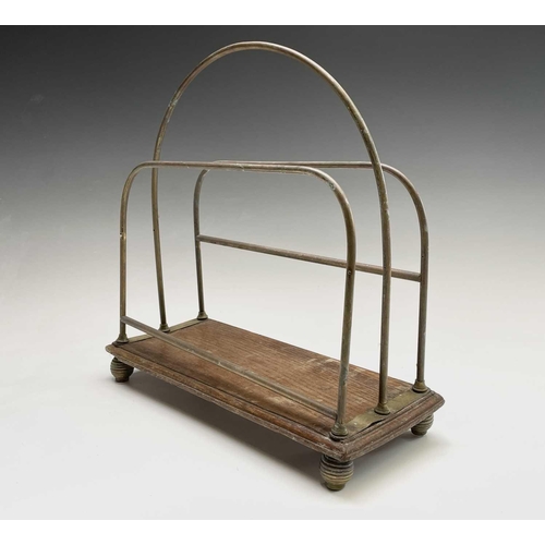 421 - An Edwardian brass and ash magazine rack, width 35.5cm, together with a folding spark guard (2).