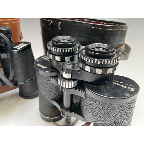 425 - A pair of Newbold & Bulford 8X30 binoculars, cased, together with other binoculars and a Photax supe... 