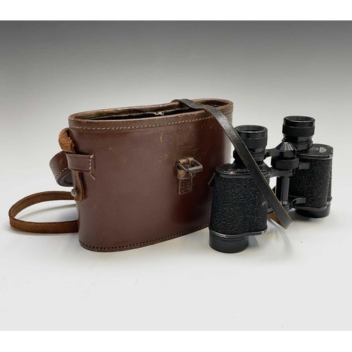 425 - A pair of Newbold & Bulford 8X30 binoculars, cased, together with other binoculars and a Photax supe... 