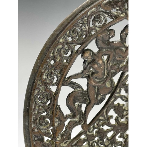 429 - A pair of cast brass circular plaques, circa 1900, pierced with Classical figures, diameter 21cm, to... 