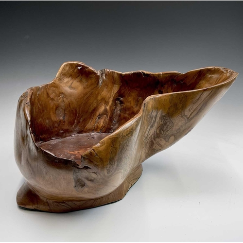 43 - A gnarled walnut large bowl, of rustic form, with misshapen rim, height 30cm, total width 58cm.