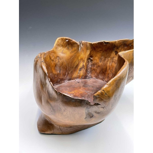 43 - A gnarled walnut large bowl, of rustic form, with misshapen rim, height 30cm, total width 58cm.