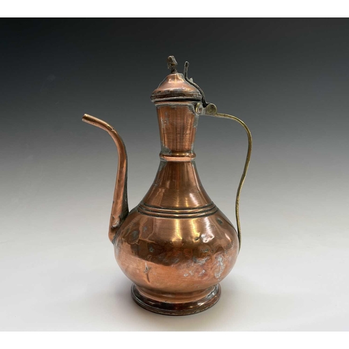 435 - Miscellaneous copperware to include an Eastern pot, an egg coddler and a spirit kettle on stand.