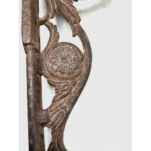 436 - A pair of cast iron aesthetic period wall brackets, with the initials T & W F, width 49.5cm.