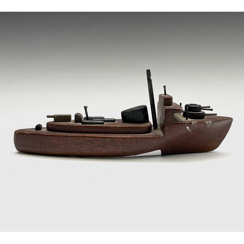 437 - A hand-built toy model gunboat, the timber from the wreck of HMS Warspite, length 22cm.