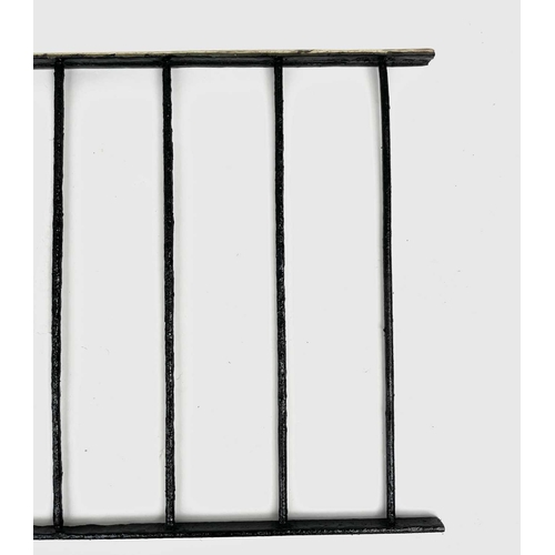 445 - A Cornish range rack, with brass mounted front, length 74.5cm, width 36.5cm.