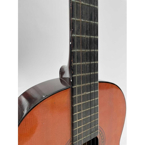 452 - Paul Young, a signed Eros six string guitar, length 99cm. Provenance - the vendor's friend, the stag... 