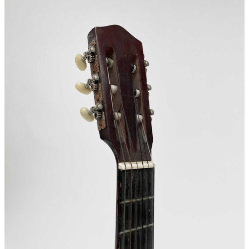 452 - Paul Young, a signed Eros six string guitar, length 99cm. Provenance - the vendor's friend, the stag... 