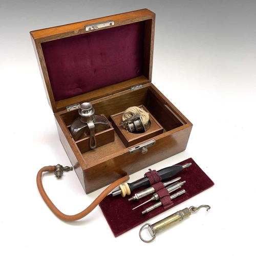 453 - A walnut cased cauterising set, probably veterinary, with ebony handle and nickel fittings, length 2... 