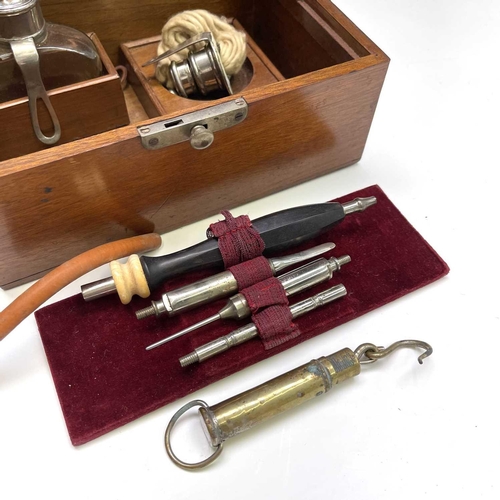 453 - A walnut cased cauterising set, probably veterinary, with ebony handle and nickel fittings, length 2... 