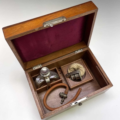 453 - A walnut cased cauterising set, probably veterinary, with ebony handle and nickel fittings, length 2... 