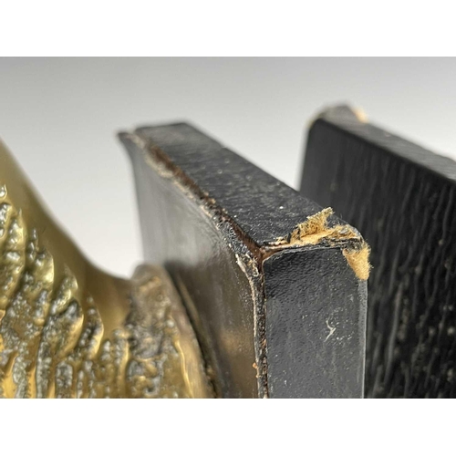 457 - A pair of brass bookends, 1920s, mounted with cast brass stags heads, height 25.5cm.