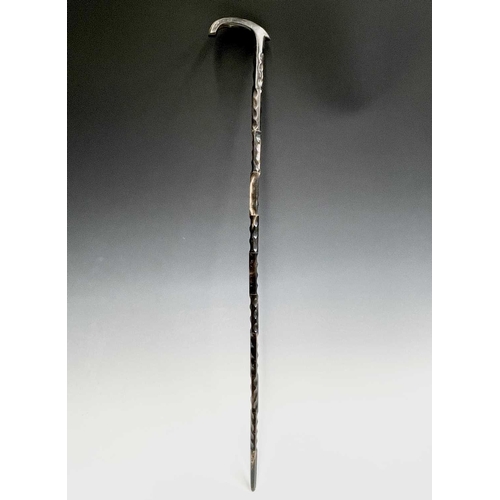 458 - A carved horn sectional walking stick, early 20th century, height 91cm.