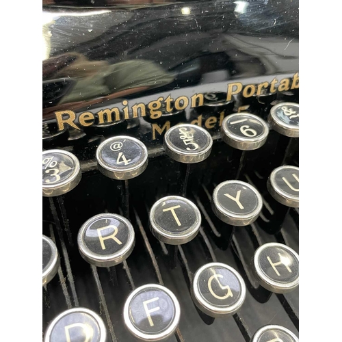 462 - A Remington Model 5 portable typewriter, cased, width 29cm, together with a Corona portable typewrit... 