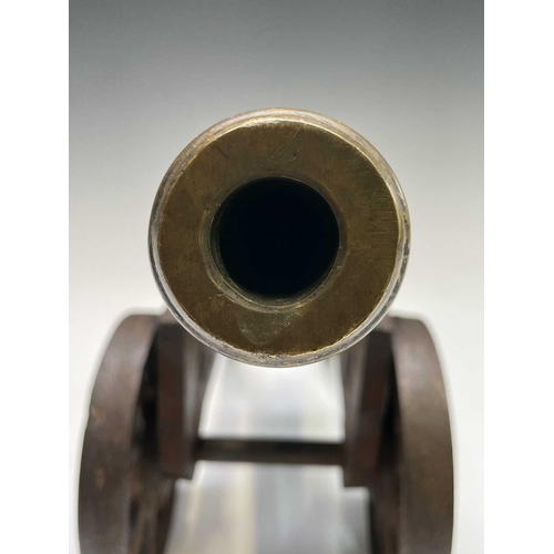 464 - A bronze and steel ships signal cannon, 19th century, 29cm barrel. 44.5cm total length.