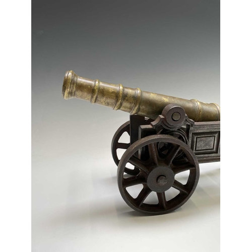 464 - A bronze and steel ships signal cannon, 19th century, 29cm barrel. 44.5cm total length.