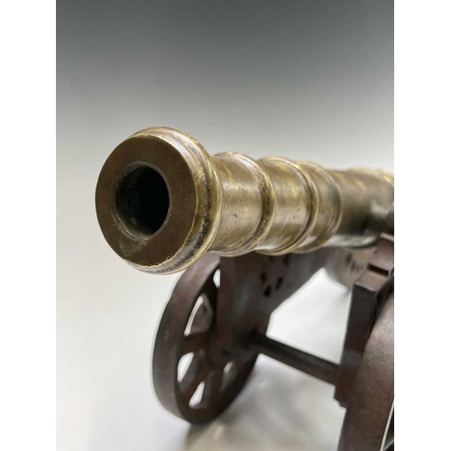 464 - A bronze and steel ships signal cannon, 19th century, 29cm barrel. 44.5cm total length.