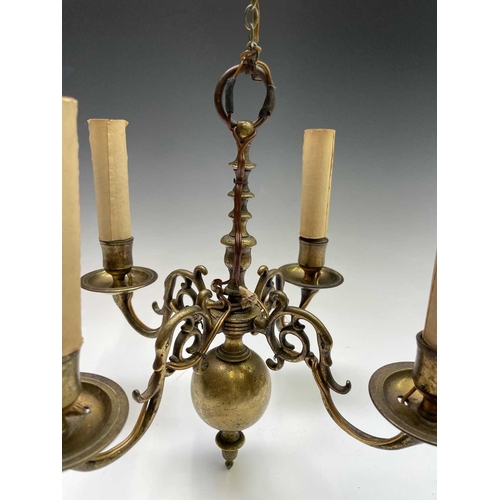 472 - A Dutch brass four branch chandelier, early 19th century, height 29cm, width 27cm.